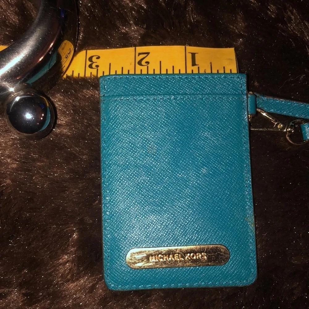 Micheal Kors  aqua blue wristlet ID card case like new